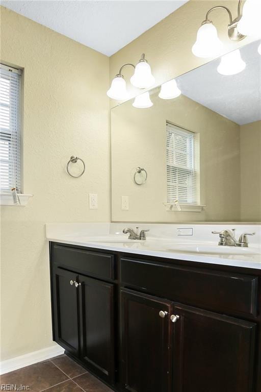 bathroom featuring vanity and tile patterned flooring