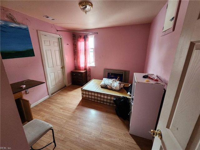 bedroom featuring light wood-type flooring