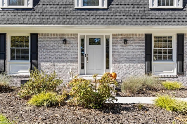 doorway to property featuring a porch