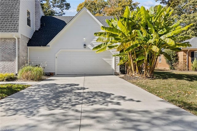 view of side of home featuring a garage