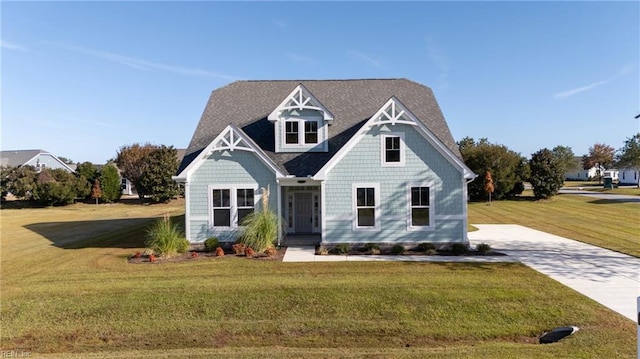 view of front of home with a front lawn