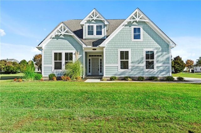 view of front of home featuring a front lawn