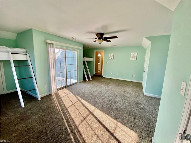 interior space with ceiling fan