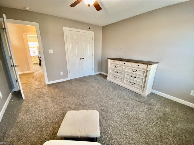 carpeted bedroom with a closet and ceiling fan