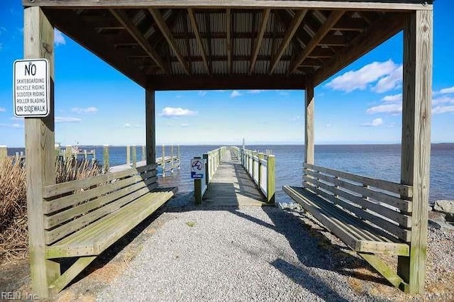 dock area with a water view