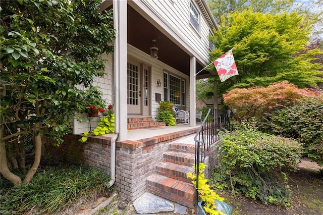 doorway to property with covered porch