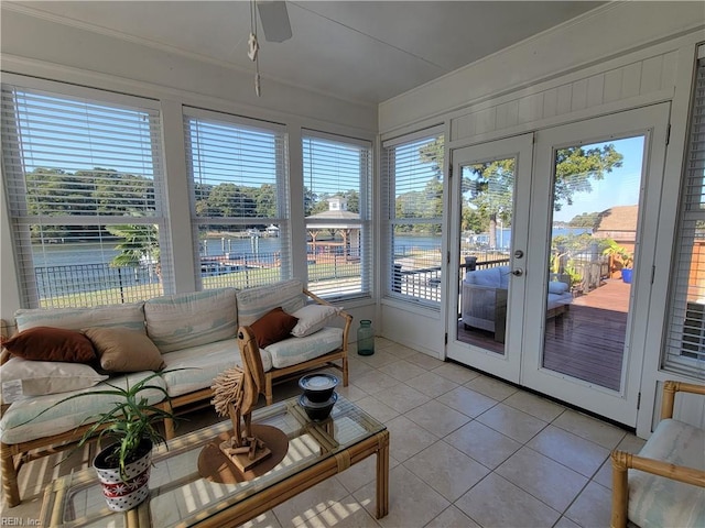 sunroom / solarium with a wealth of natural light and french doors