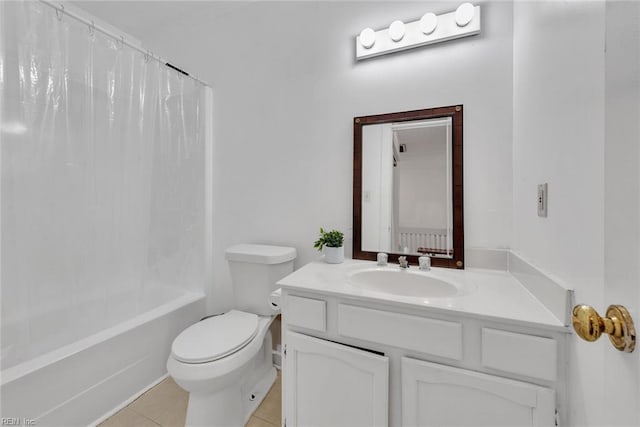 full bathroom featuring vanity, shower / tub combo with curtain, toilet, and tile patterned flooring