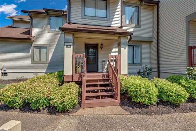 entrance to property with a porch