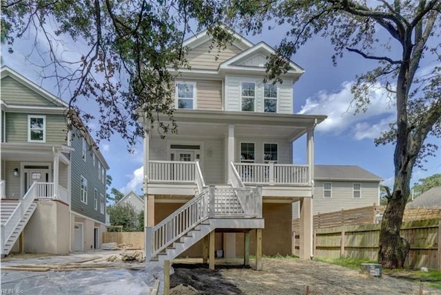 2616 Pretty Lake Ave, Norfolk, VA 23518 - coastal home featuring stairway and a porch