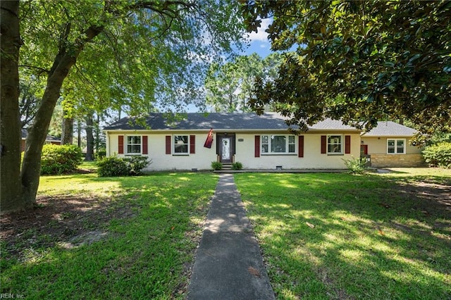 ranch-style home with a front yard