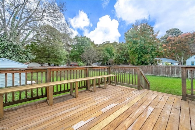 deck featuring a lawn