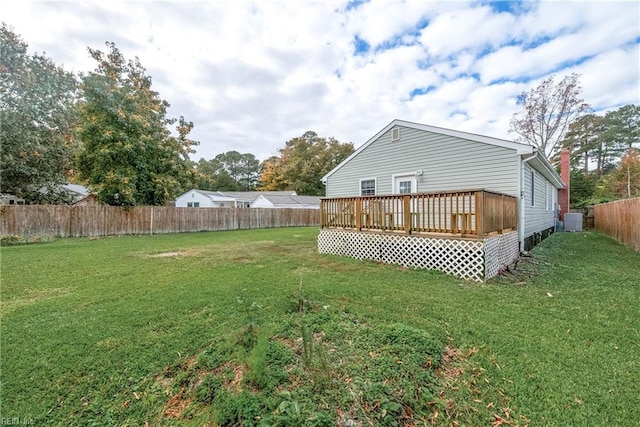 view of yard featuring a wooden deck