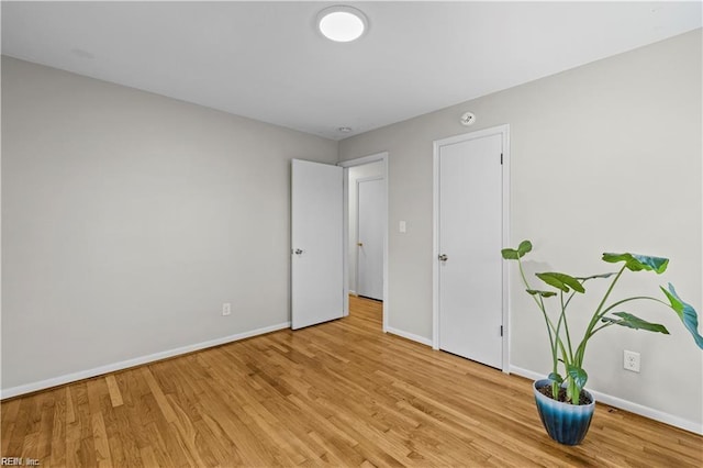 empty room with light wood-type flooring