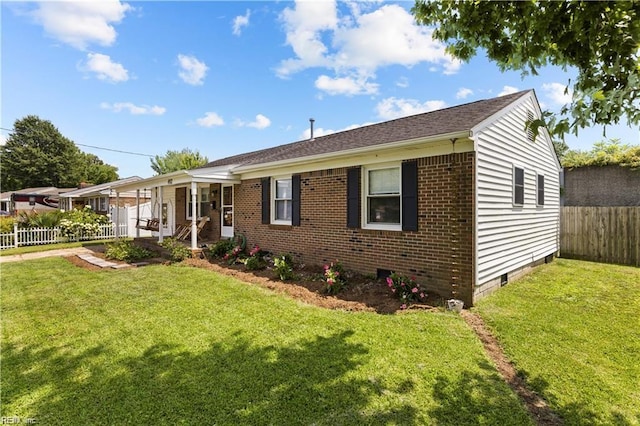 ranch-style home with a front yard