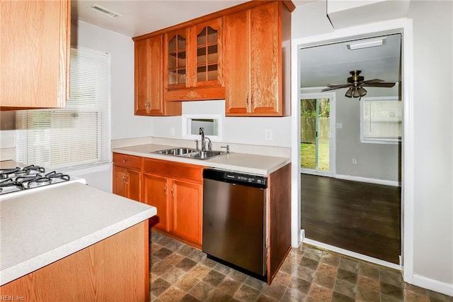 kitchen with dark wood-type flooring, stainless steel dishwasher, sink, and ceiling fan