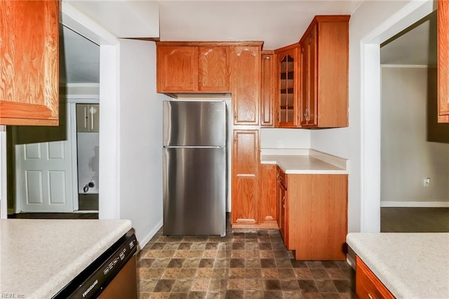 5111 81st St, Hampton, VA 23605 - kitchen with appliances with stainless steel finishes, light countertops, baseboards, glass insert cabinets, and ornamental molding