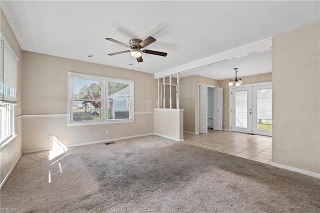 carpeted empty room with ceiling fan