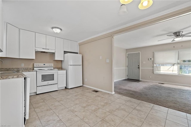 kitchen featuring light carpet, sink, white cabinetry, white appliances, and ceiling fan