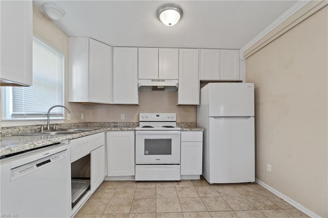 kitchen with white appliances, light stone countertops, light tile patterned flooring, sink, and white cabinetry