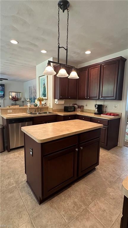 kitchen with dishwasher, dark brown cabinetry, sink, and hanging light fixtures