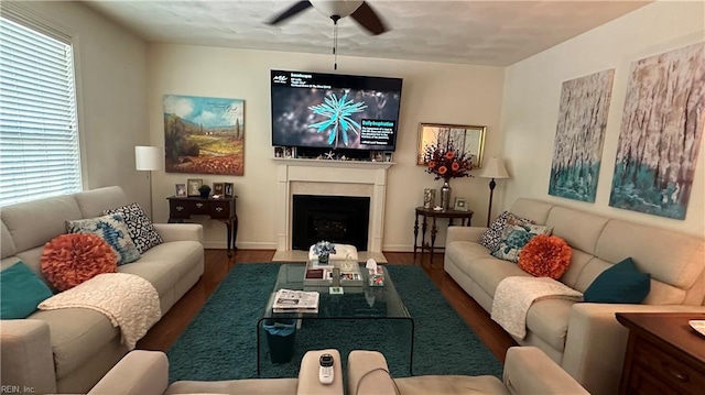 living room with hardwood / wood-style floors and ceiling fan