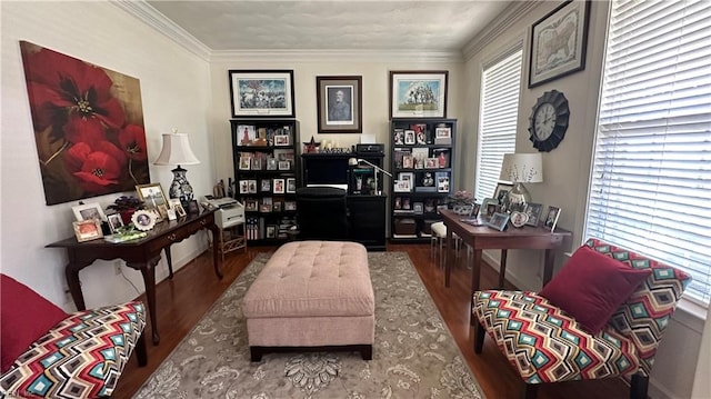 sitting room featuring crown molding and wood-type flooring