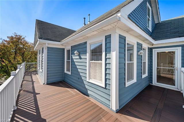 view of home's exterior featuring a deck