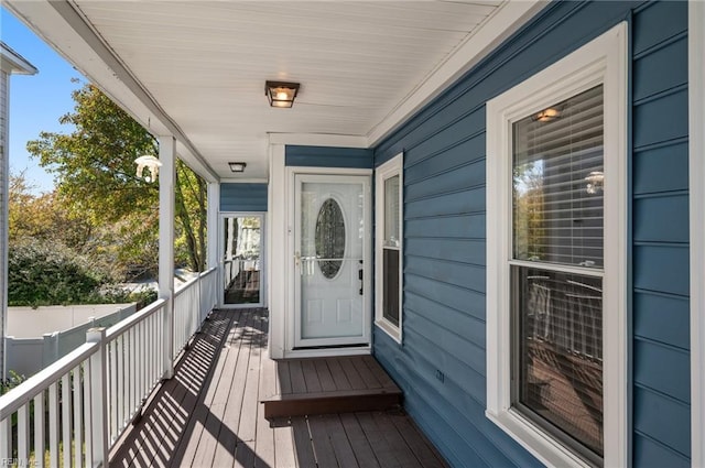 doorway to property featuring a porch