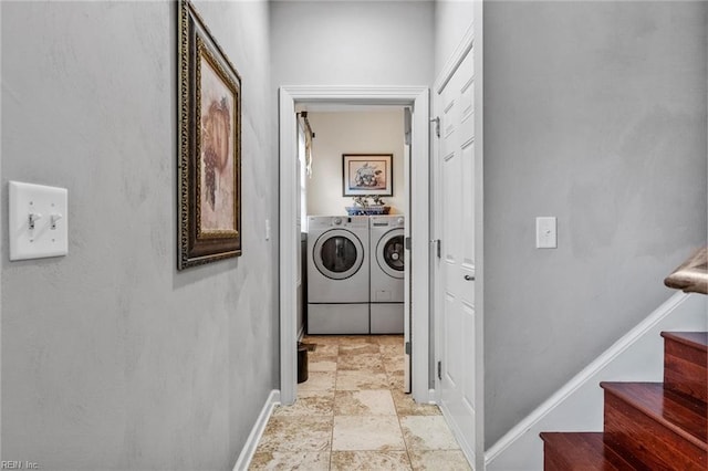 laundry room featuring washing machine and clothes dryer