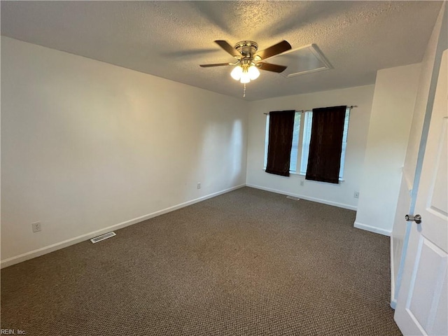 carpeted empty room with a textured ceiling and ceiling fan