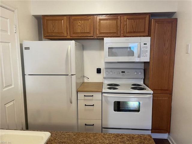 kitchen featuring white appliances