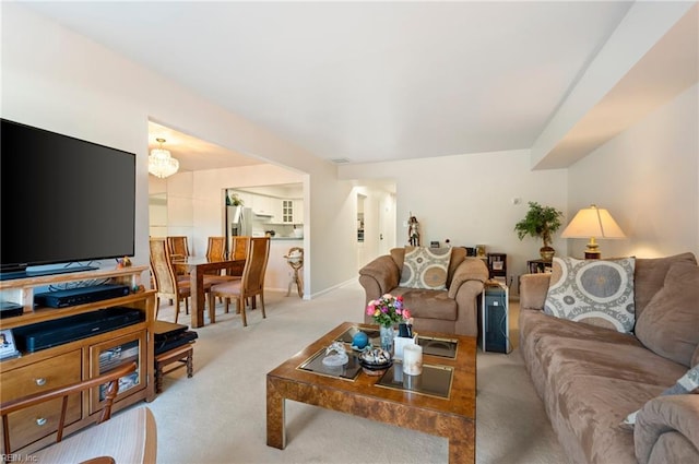 living room with light colored carpet