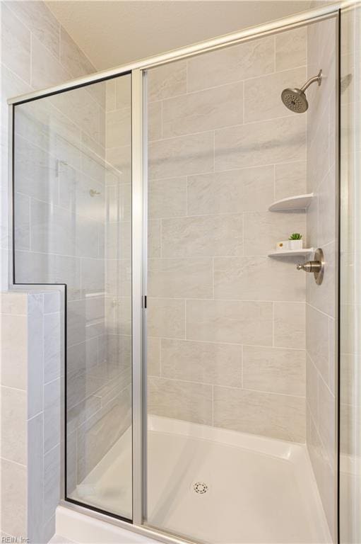 bathroom featuring walk in shower