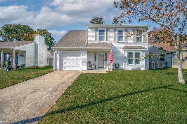 view of front of home featuring a front lawn and a garage