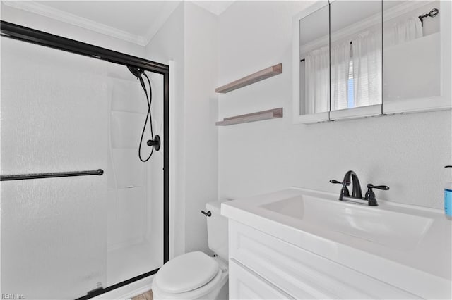 bathroom with vanity, crown molding, toilet, and an enclosed shower