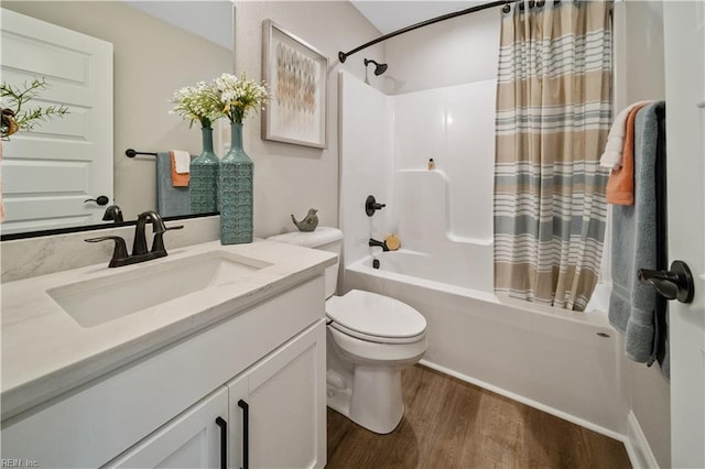 full bathroom with vanity, shower / bath combination with curtain, toilet, and wood-type flooring