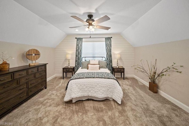 carpeted bedroom featuring wood walls, lofted ceiling, and ceiling fan