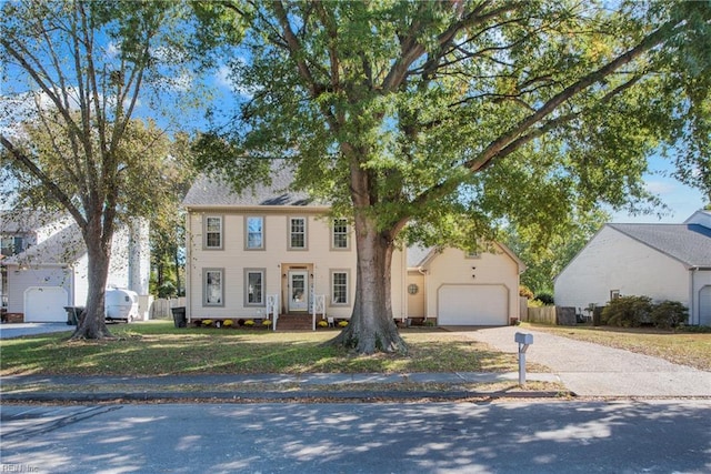 colonial home with a garage