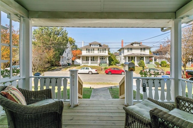 deck featuring covered porch