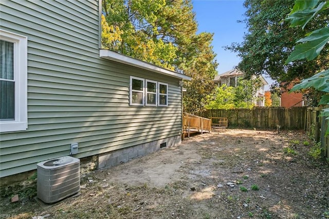 view of property exterior with central AC unit