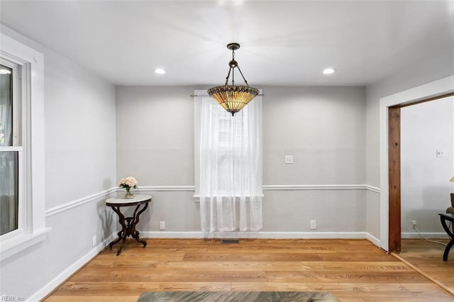 dining area featuring hardwood / wood-style flooring