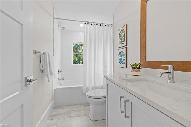 full bathroom featuring vanity, shower / bath combination with curtain, and toilet