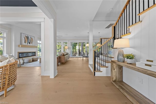 entrance foyer with light hardwood / wood-style floors