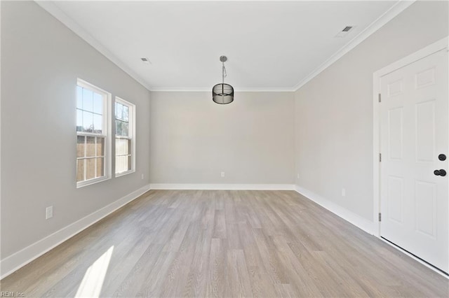 unfurnished dining area with ornamental molding and light hardwood / wood-style floors