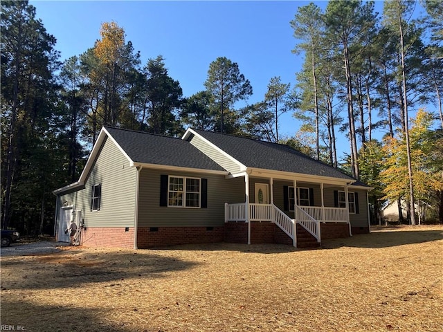 single story home with a porch