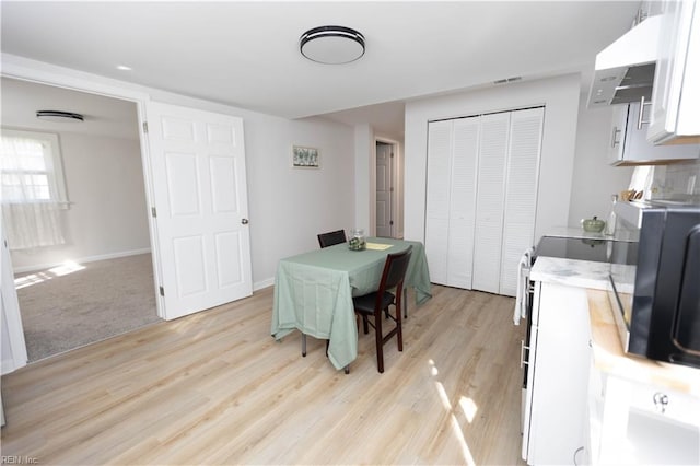 dining area featuring light hardwood / wood-style flooring