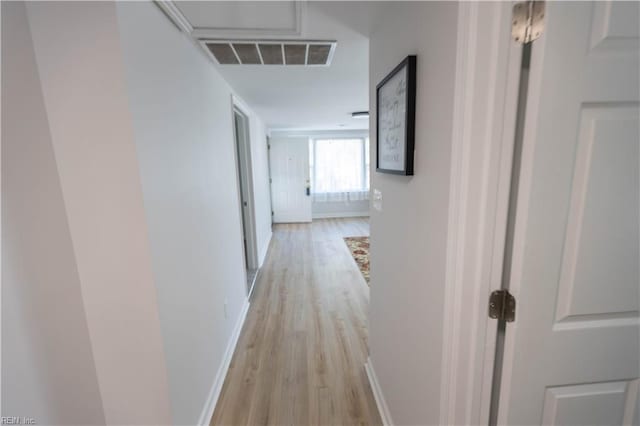 corridor featuring light wood-type flooring