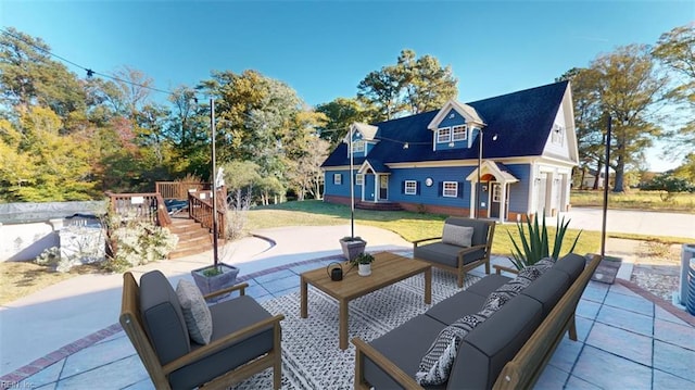 view of patio / terrace featuring a garage