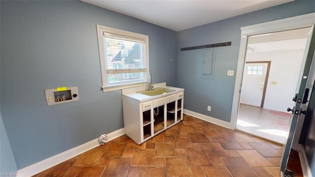 laundry room featuring hookup for a washing machine and sink